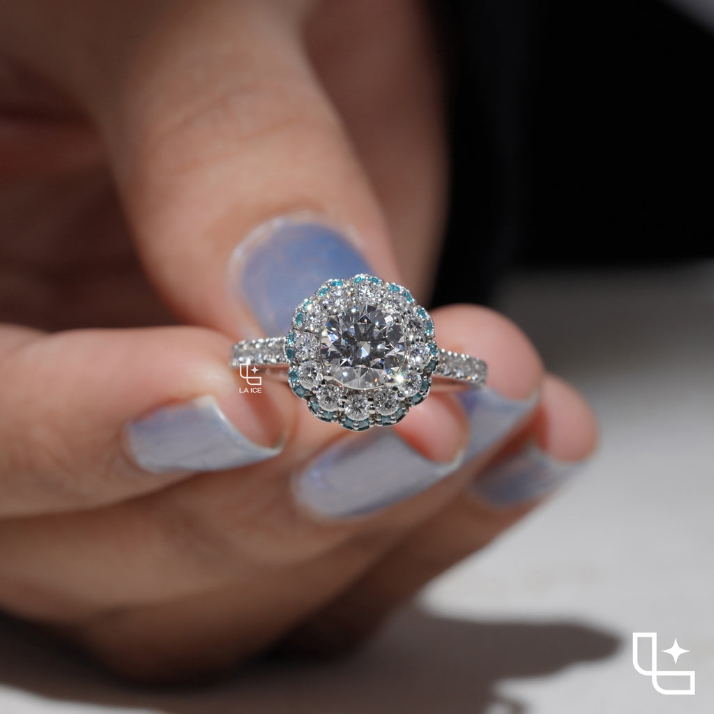 Round Cut Floral Halo Engagement Ring with Blue Accent Stones