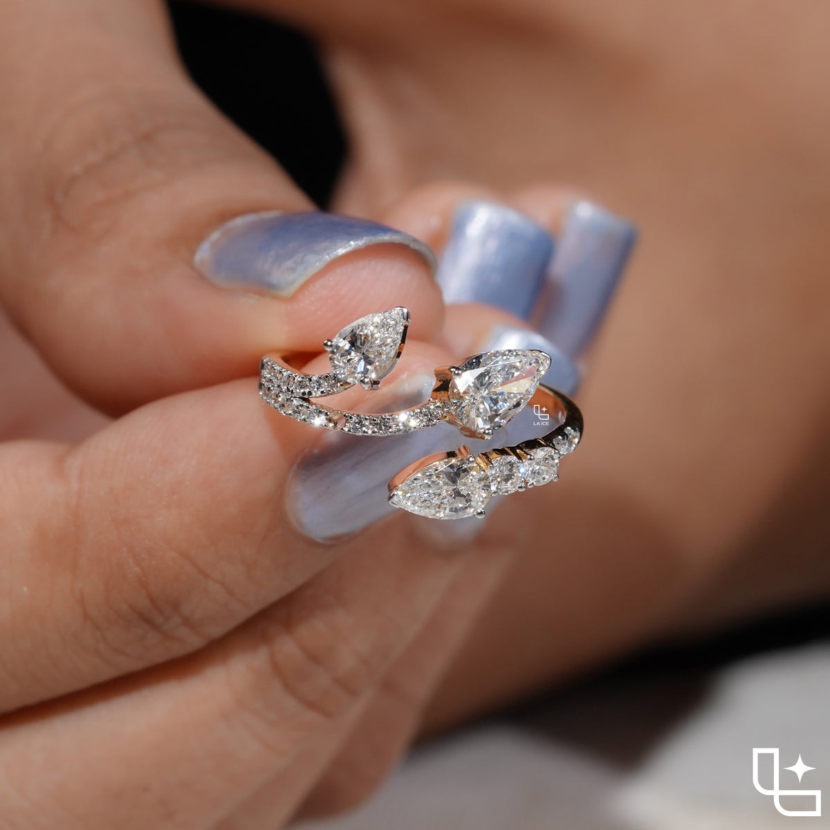 Three Stone Pear Cut Ring with Open Bypass Band and Pavé Accents