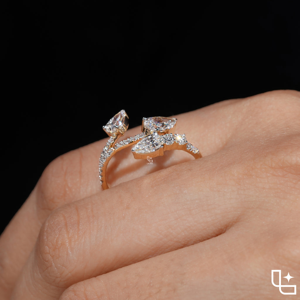 Three Stone Pear Cut Ring with Open Bypass Band and Pavé Accents