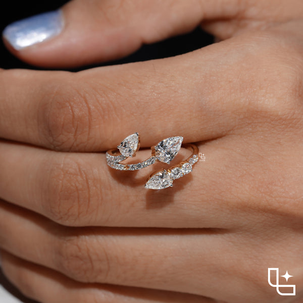 Three Stone Pear Cut Ring with Open Bypass Band and Pavé Accents