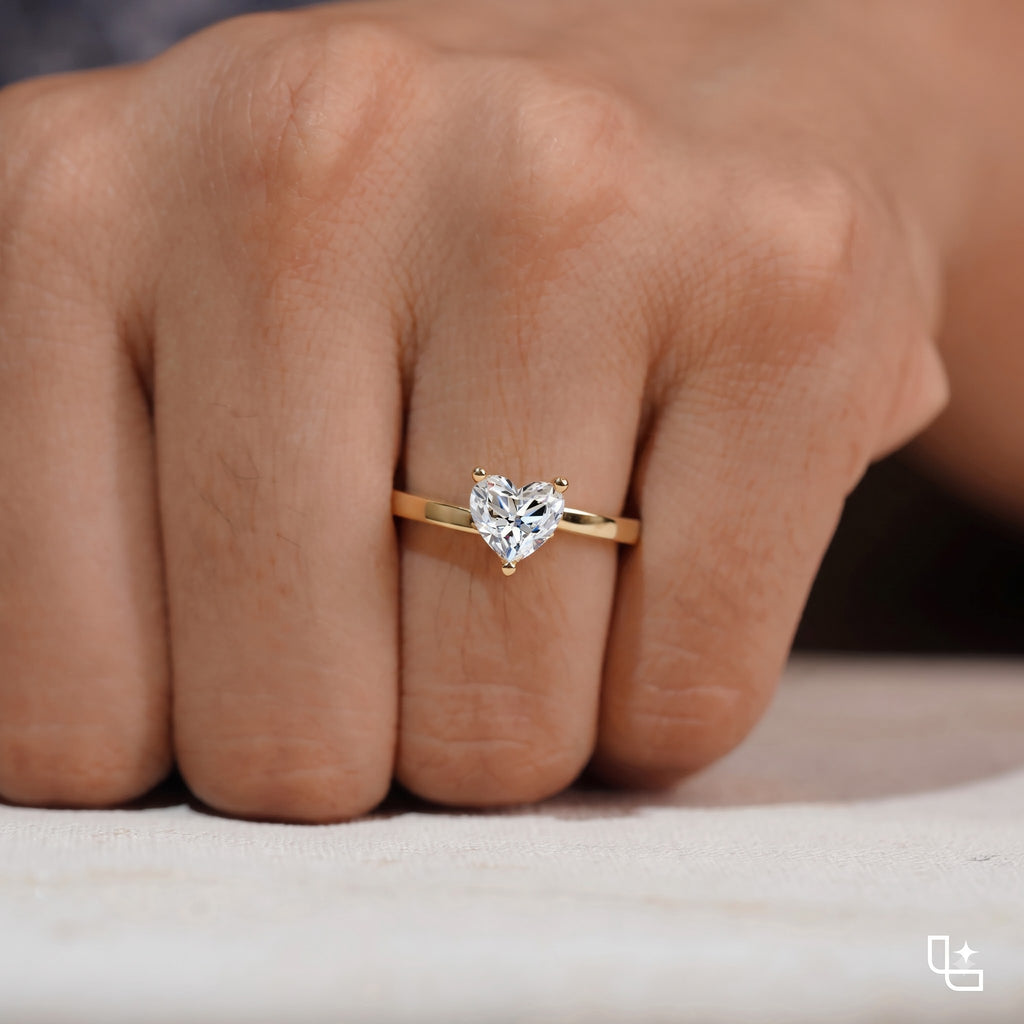 Heart Shaped Solitaire Engagement Ring with Polished Band