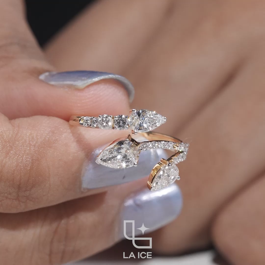 Three Stone Pear Cut Ring with Open Bypass Band and Pavé Accents