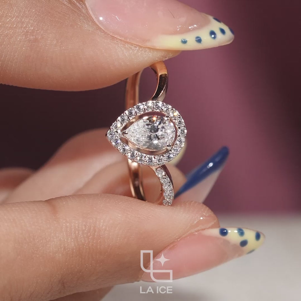 Pear Cut Halo Engagement Ring with Curved Band and Pavé Accent Stones