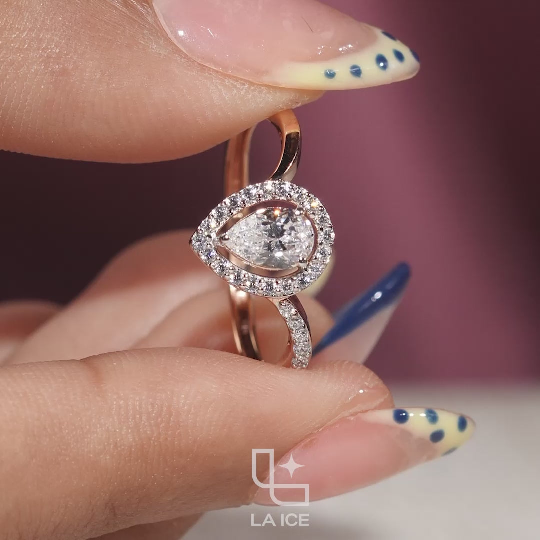 Pear Cut Halo Engagement Ring with Curved Band and Pavé Accent Stones
