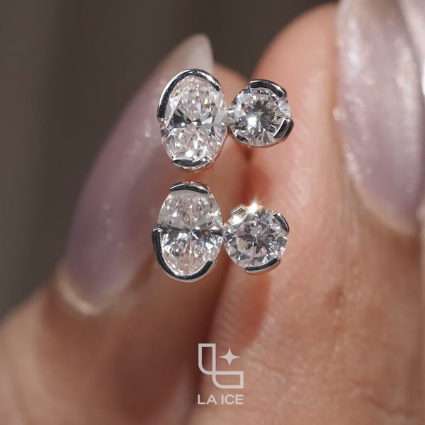 Oval and Round Cut Two Stone Stud Earrings with Asymmetrical Design, 1.50 CT Total Diamond Weight